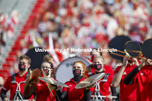 Cornhusker Marching Band, Cheer Squad and Homecoming Royalty met in the empty Memorial Stadium to re