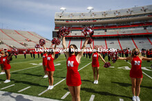 Cornhusker Marching Band, Cheer Squad and Homecoming Royalty met in the empty Memorial Stadium to re