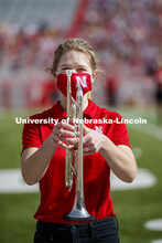 Cornhusker Marching Band, Cheer Squad and Homecoming Royalty met in the empty Memorial Stadium to re