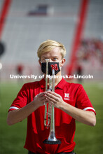 Cornhusker Marching Band, Cheer Squad and Homecoming Royalty met in the empty Memorial Stadium to re
