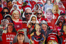 Cardboard cutouts of fans fill the stands in Memorial Stadium. Cornhusker Marching Band, Cheer Squad