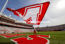 Cornhusker Marching Band, Cheer Squad and Homecoming Royalty met in the empty Memorial Stadium to re