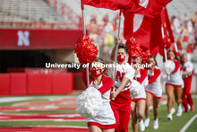 Cornhusker Marching Band, Cheer Squad and Homecoming Royalty met in the empty Memorial Stadium to re