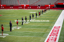 Cornhusker Marching Band, Cheer Squad and Homecoming Royalty met in the empty Memorial Stadium to re
