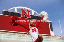 Cornhusker Marching Band, Cheer Squad and Homecoming Royalty met in the empty Memorial Stadium to re
