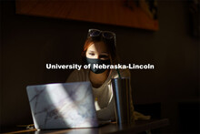 Emily Diesing, a sophomore from Omaha, studies in a ray of afternoon sunshine in the Nebraska Union.