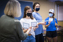 Students in Barbara Terwilliger’s Health and Wellness in the Elementary Classroom course do “ene