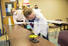 Students in Barbara Terwilliger’s Health and Wellness in the Elementary Classroom course do “ene