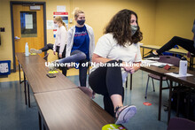 Students in Barbara Terwilliger’s Health and Wellness in the Elementary Classroom course do “ene