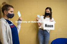 Students in Barbara Terwilliger’s Health and Wellness in the Elementary Classroom course do “ene
