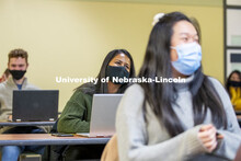 A student interacts with Professor Crystal Garcia during the CEHS Educational Administration class: 