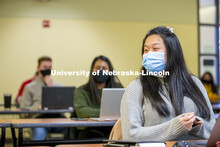 A student interacts with Professor Crystal Garcia during the CEHS Educational Administration class: 