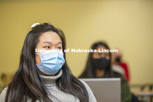 A student interacts with Professor Crystal Garcia during the CEHS Educational Administration class: 