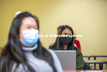 A student interacts with Professor Crystal Garcia during the CEHS Educational Administration class: 