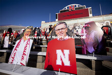 Chancellor Ronnie Green his wife, Jane, are among the more than 6,000 corrugated plastic cutouts fil