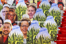 You can’t have Cornhuskers without corn. More than 6,000 corrugated plastic cutouts fill the lower