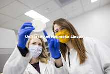 Kari Heck and Ashley Toney look over a sample in the Nebraska Food for Health Center lab. November 1