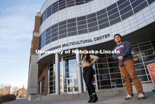 Unyoh Mbilain and Fernando Wisniewski-Pena in front of the Jackie Gaughan Multicultural Center. Phot