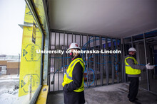 Chancellor Ronnie Green admires the view from a hotel room during a tour of the under-construction S