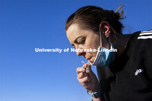 Jessica Calvi, a research assistant professor with the Nebraska Athletic Performance Lab, demonstrat