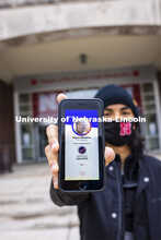 Yajyoo Shrestha shows the Safer Community app to be used as part of COVID testing on campus this spr