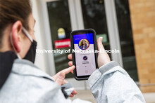 Taylor Daum shows the Safer Community app to be used as part of COVID testing on campus this spring.