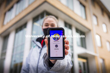 Taylor Daum shows the Safer Community app to be used as part of COVID testing on campus this spring.