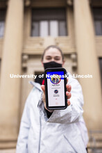Taylor Daum shows the Safer Community app to be used as part of COVID testing on campus this spring.