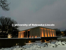 Sheldon is lit up on a snowy night on City Campus. Snow in January on City Campus. January 27, 2021.