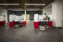Taylor Ruwe, a freshman from Hooper, NE, studies in a pod similar to a first-class airline seat in t