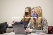 Students listen in a classroom as Roberto Stein teaches FINA 475 - Strategic Financial Management. F