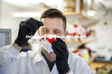 Grad students working in the Ryan Pedrigi biosystems engineering lab in Scott Engineering Center. Fe
