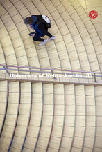 Students climb the steps to the lower level of the Nebraska Union. February 4, 2021. 