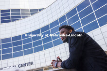 Damien Niyonshuti, an integrated science major from Kigali, Rwanda, stands in front of the Gaughan M