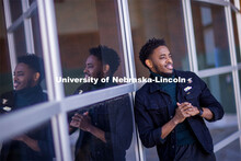 Damien Niyonshuti, an integrated science major from Kigali, Rwanda, stands in front of the Gaughan M