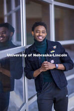Damien Niyonshuti, an integrated science major from Kigali, Rwanda, stands in front of the Gaughan M