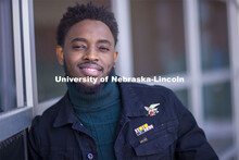 Damien Niyonshuti, an integrated science major from Kigali, Rwanda, stands in front of the Gaughan M