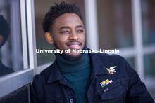Damien Niyonshuti, an integrated science major from Kigali, Rwanda, stands in front of the Gaughan M