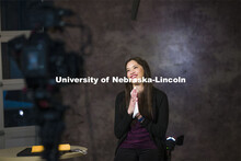 Karen Wills, University Program Council Nebraska Program Coordinator, reacts while reading a letter 