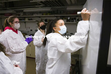 Symone Arends takes notes as her CSI team prepares to work the mock crime scene. Forensic Science 48