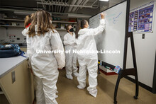 Symone Arends takes notes as her CSI team prepares to work the mock crime scene. Forensic Science 48