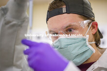 Evan Brende pipettes a DNA sample. Forensic Science 485 is the capstone for the seniors. The CSI opt