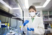 Rebecca Roston, associate professor in biochemistry, stirs liquid that will be combined to make soap