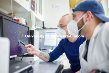 Evan LaBrant points to the coloration on the nucleus, which is irregular, and indicates the protein 