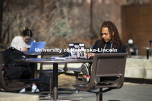 Students studying outside enjoying the warm weather on city campus. March 4, 2021. 