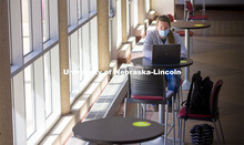 Megan Eichhoff participates in an online class in the open lobby of the Animal Science Complex on Ea