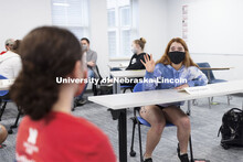 Maria Benes, faculty affiliate with the Honors Program and course instructor, discusses the day’s 
