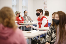 Maria Benes, faculty affiliate with the Honors Program and course instructor, discusses the day’s 