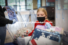 Kylie Muller sorts recyclable paper from Agriculture Hall during Wednesday’s sort. Environmental S