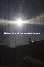 Love Library is seen silhouetted through the window shade in a Hamilton Hall chemistry lab.  April 1